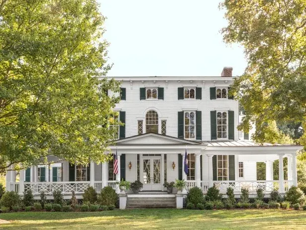 Classic Southern home in Tuscaloosa shaded by mature oaks